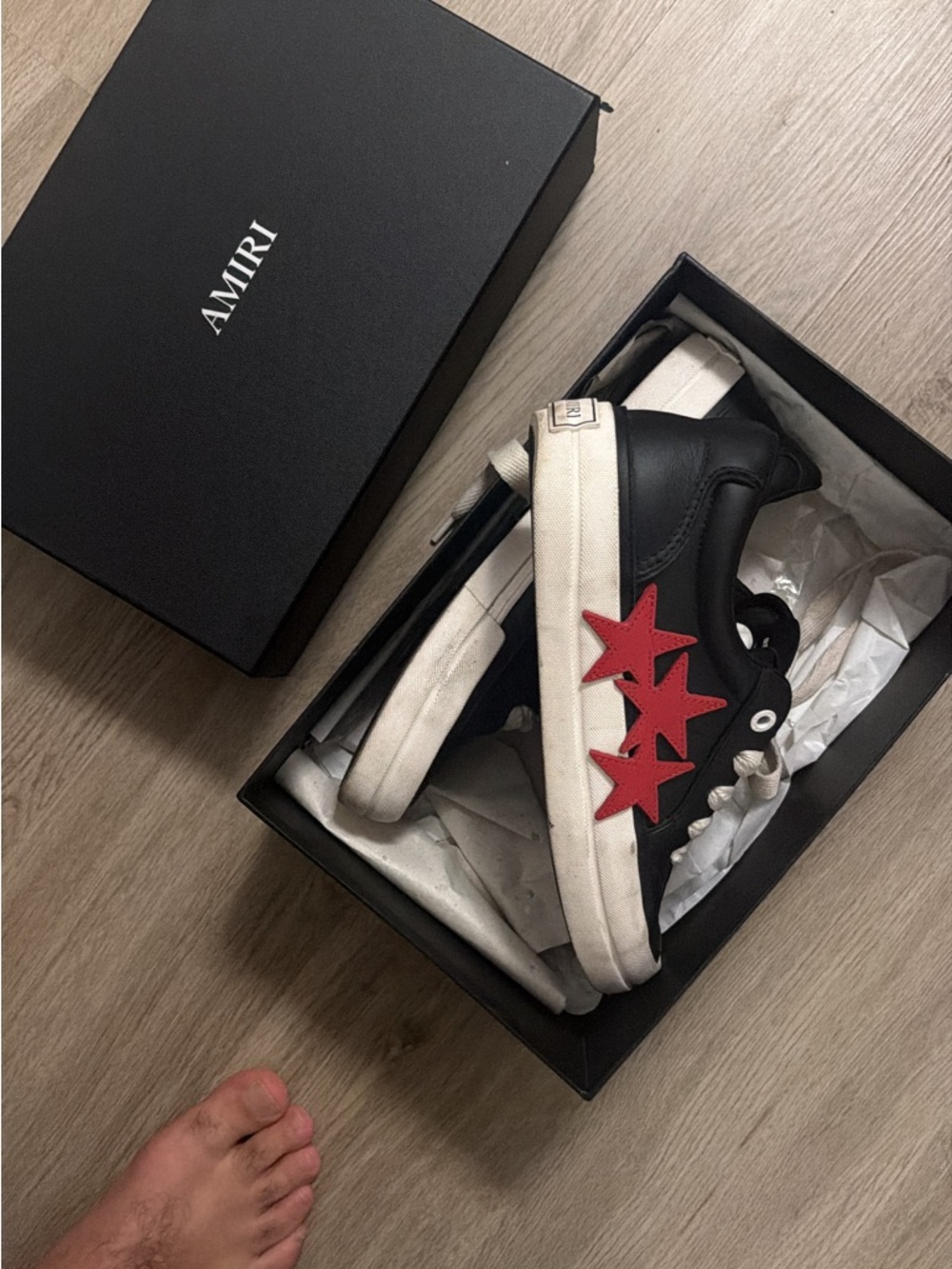 AMIRI Black Leather Sneakers with Red Star Accents